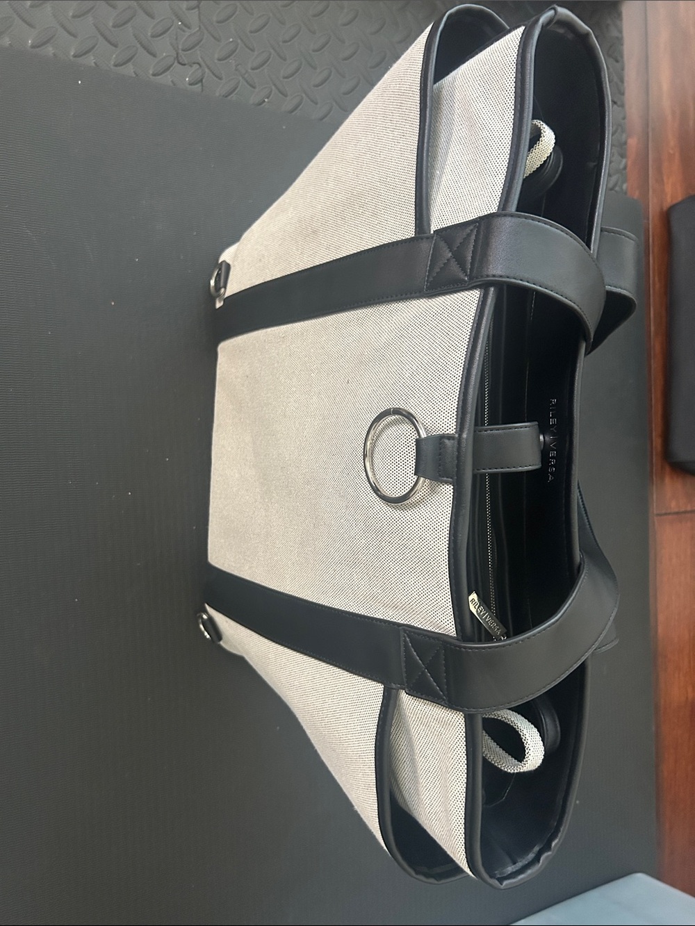 Riley Versa Oh Baby Bag. Grey Canvas with Black Trim and Ring Accent - Tote
